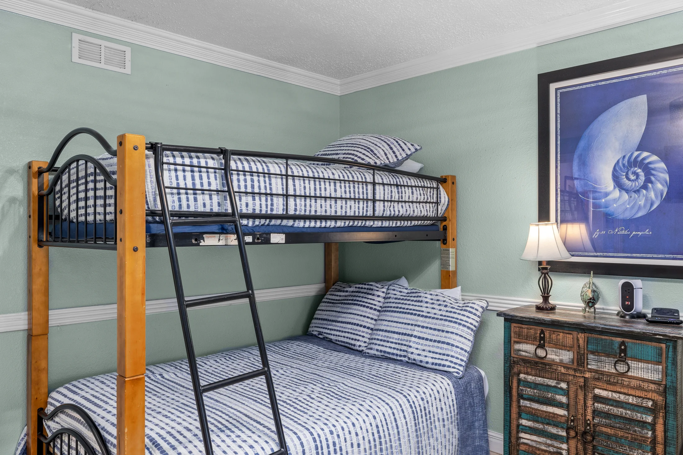 Bunk room with two twin-over-full bunk beds